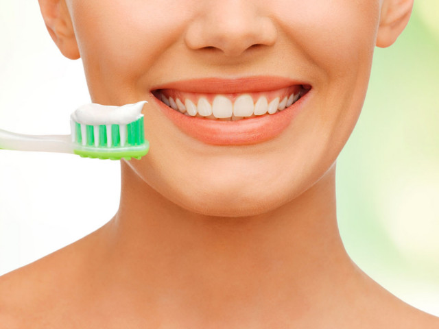 pulire apparecchio denti